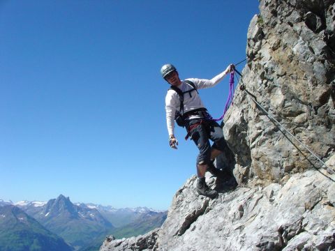 Climbing a rock in St. Anton at the Arlberg