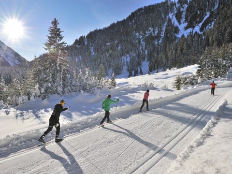 Cross-country skiing in the mountains surrounding the Hotel Kirchplatz